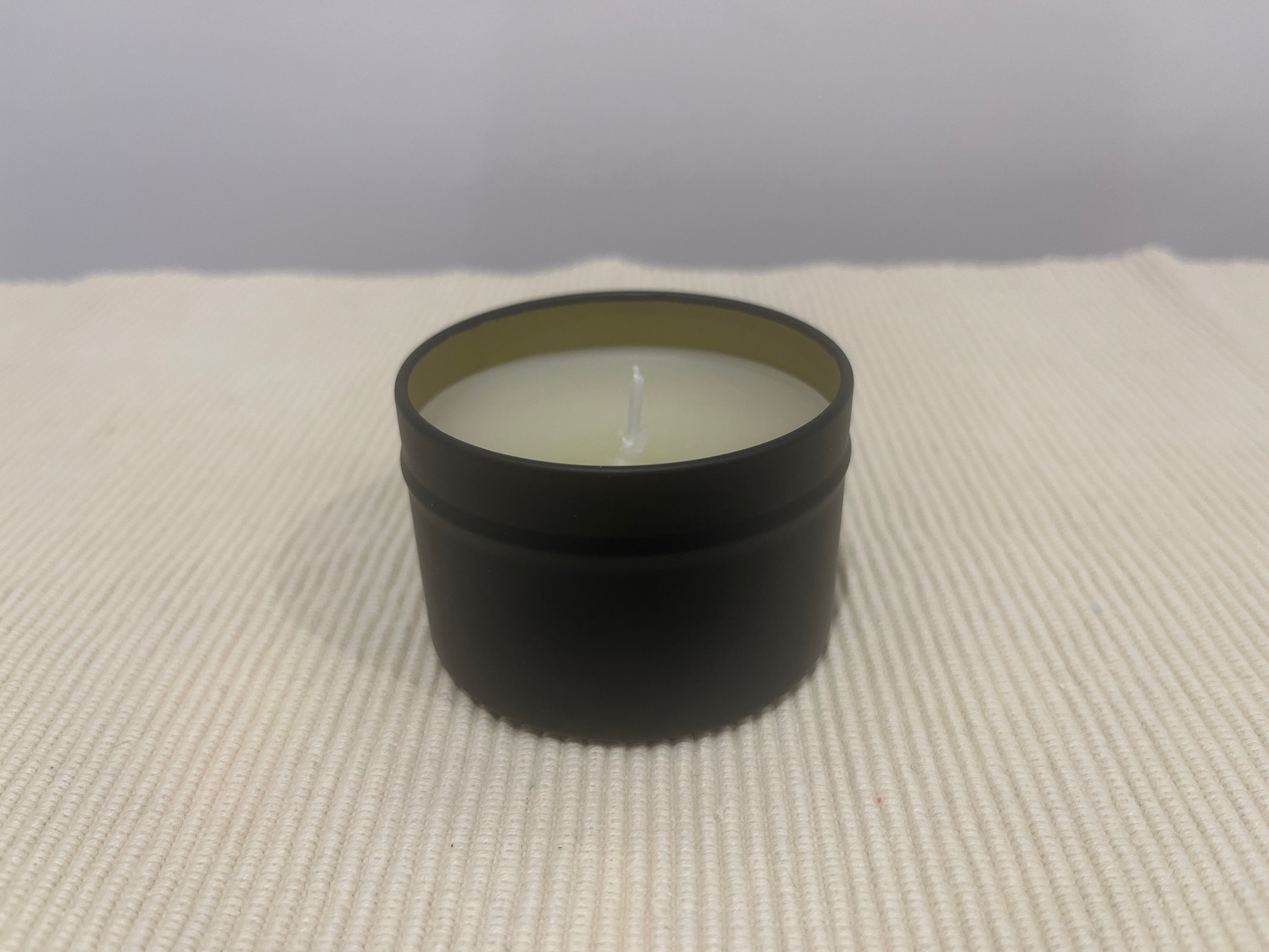 Scented candles in tins